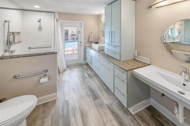 Bathroom, Dual Sink Vanities, Interior, Recessed Lighting, Wood Texture Flooring