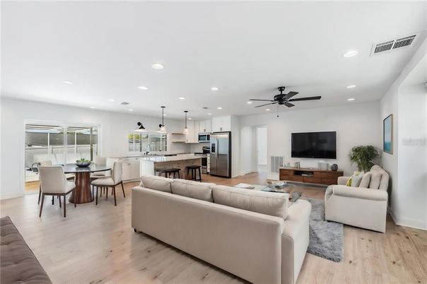 Dining room, Interior, Kitchen, Living room, Pendant Lights, Recessed Lighting, Stainless Steel Appliances, Wood Texture Flooring