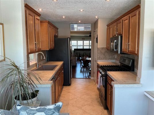 Dining room, Interior, Kitchen, Recessed Lighting, Tile Countertops