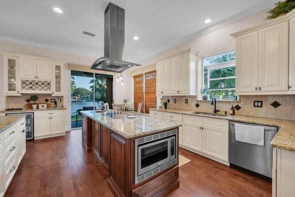 Dining room, Interior, Kitchen, Recessed Lighting, Stainless Steel Appliances, Wood Texture Flooring
