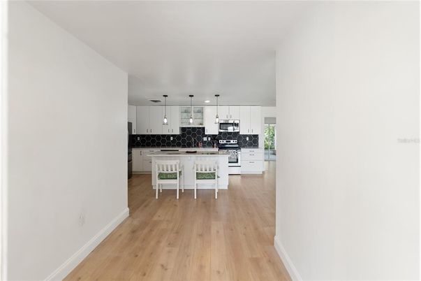 Interior, Kitchen, Pendant Lights, Stainless Steel Appliances, Wood Texture Flooring