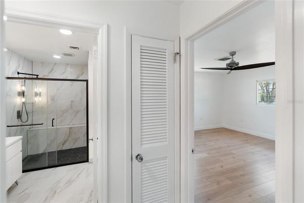 Bathroom, Interior, Marble, Marble Walls, Recessed Lighting, Wood Texture Flooring