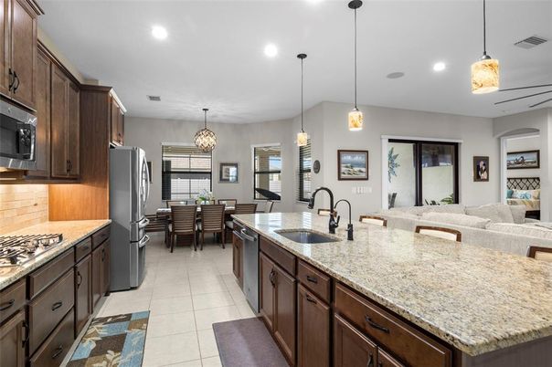 Chandelier, Dining room, Interior, Kitchen, Living room, Pendant Lights, Recessed Lighting, Stainless Steel Appliances