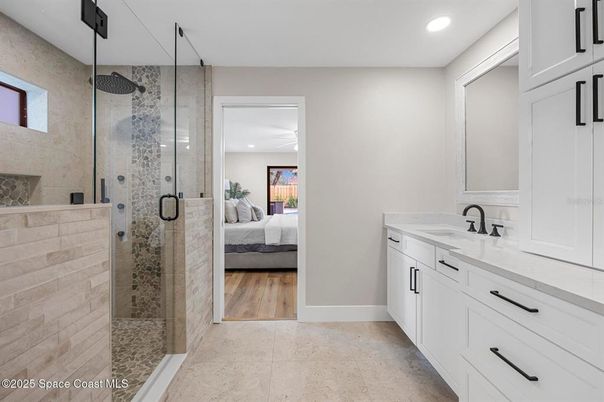 Bathroom, Bedroom, Glass Shower, Interior, Recessed Lighting, Wood Texture Flooring