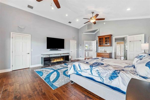 Bedroom, Fireplace, Interior, Recessed Lighting, Wood Texture Flooring