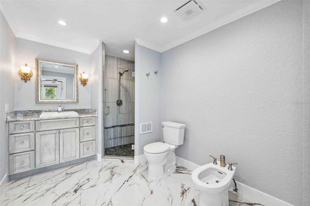 Bathroom, Dual Sink Vanities, Glass Shower, Interior, Marble, Recessed Lighting