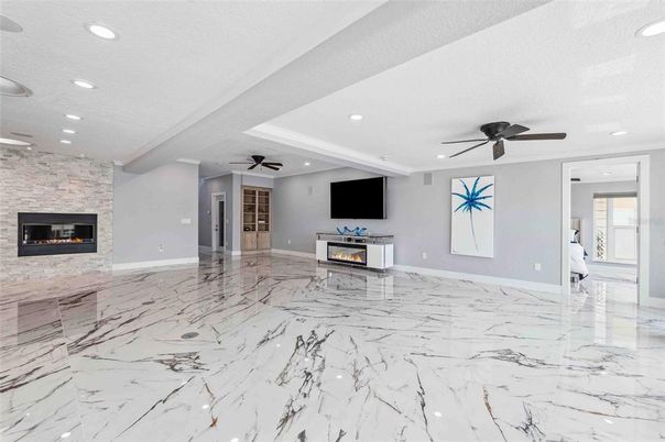 Empty room, Fireplace, Interior, Marble, Recessed Lighting, Stone Walls