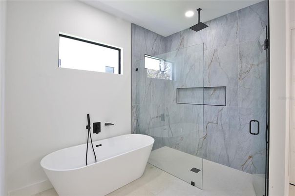 Bathroom, Free Standing Baths, Glass Shower, Interior, Marble Walls, Recessed Lighting