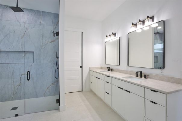 Bathroom, Dual Sink Vanities, Glass Shower, Interior, Marble Walls