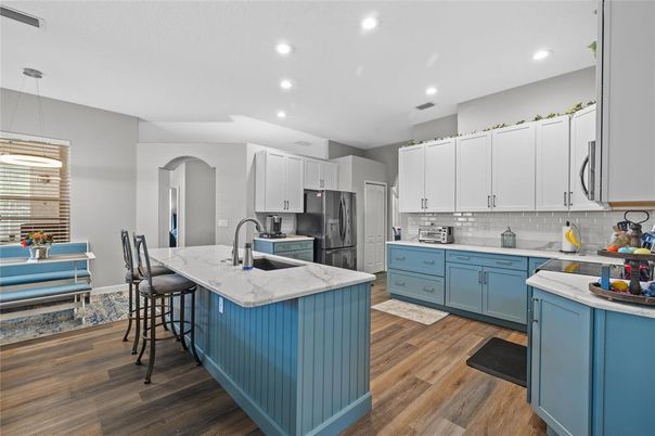 Interior, Kitchen, Pendant Lights, Recessed Lighting, Stainless Steel Appliances, Wood Texture Flooring