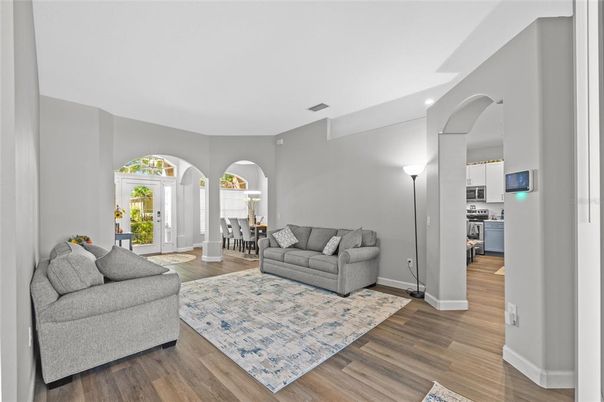 Dining room, Interior, Kitchen, Living room, Recessed Lighting, Stainless Steel Appliances, Wood Texture Flooring