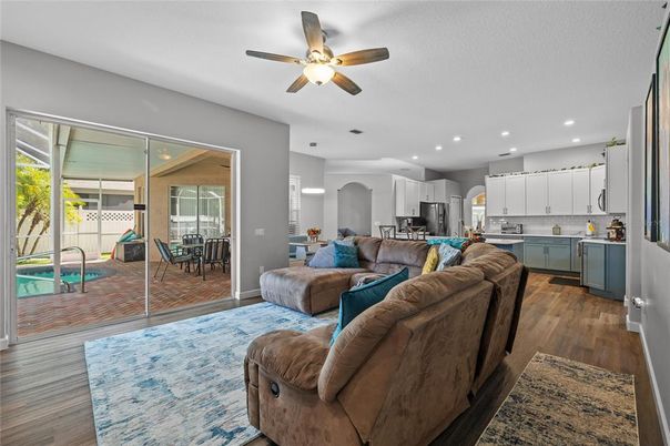 Dining room, Interior, Kitchen, Living room, Recessed Lighting, Stainless Steel Appliances, Wood Texture Flooring