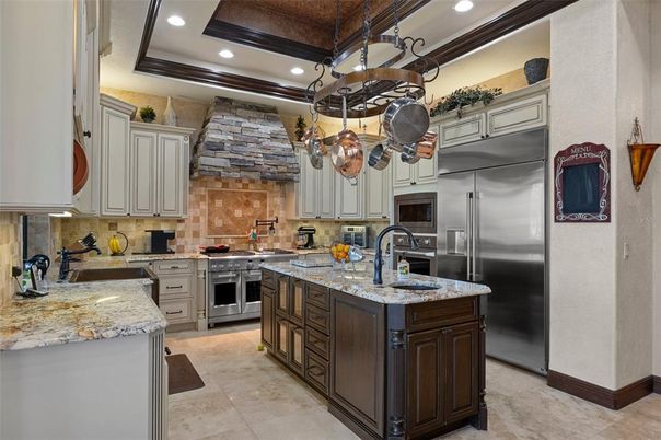 Interior, Kitchen, Recessed Lighting, Stainless Steel Appliances, Stone Walls