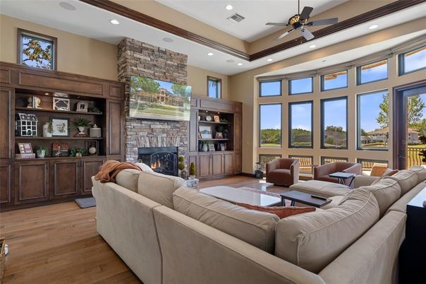Fireplace, Interior, Living room, Recessed Lighting, Stone Walls, Wood Texture Flooring