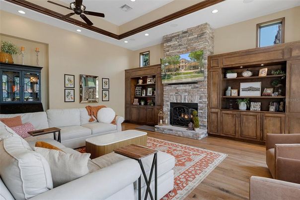 Fireplace, Interior, Living room, Recessed Lighting, Stone Walls, Wood Texture Flooring