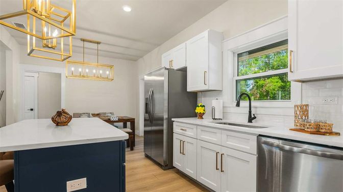 Dining room, Interior, Kitchen, Pendant Lights, Recessed Lighting, Stainless Steel Appliances, Wood Texture Flooring