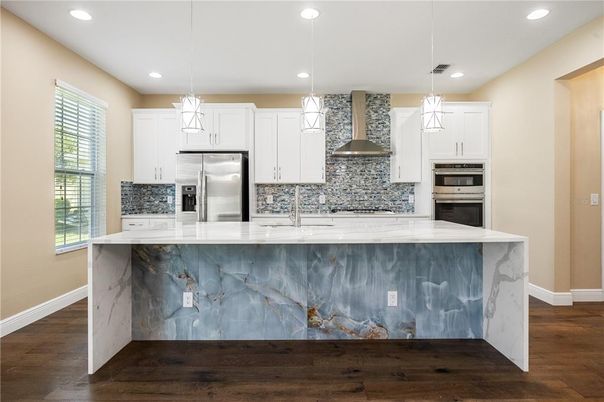 Interior, Kitchen, Pendant Lights, Recessed Lighting, Stainless Steel Appliances, Wood Texture Flooring
