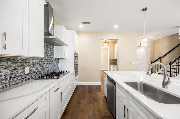 Interior, Kitchen, Pendant Lights, Recessed Lighting, Stainless Steel Appliances, Wood Texture Flooring