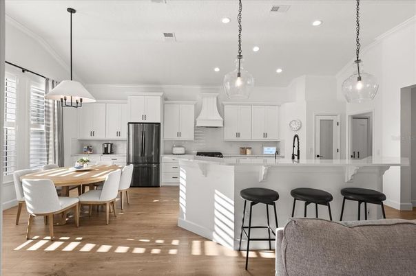 Dining room, Interior, Kitchen, Pendant Lights, Recessed Lighting, Stainless Steel Appliances, Wood Texture Flooring