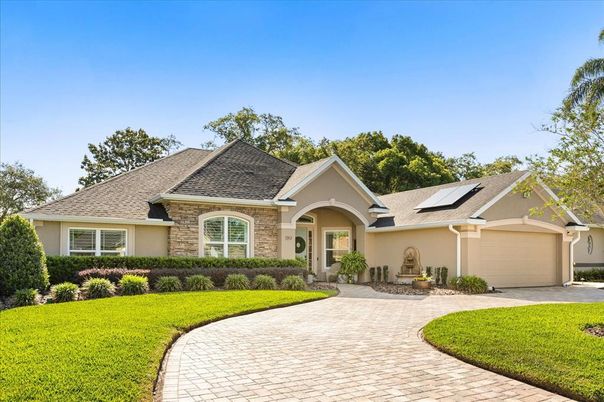 Attached, Backyard, Exterior, Facade, Solar Panels, Brick Traditional