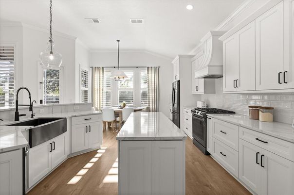 Dining room, Interior, Kitchen, Pendant Lights, Recessed Lighting, Stainless Steel Appliances, Wood Texture Flooring