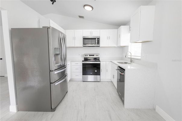 Interior, Kitchen, Marble, Recessed Lighting, Stainless Steel Appliances, Wood Texture Flooring