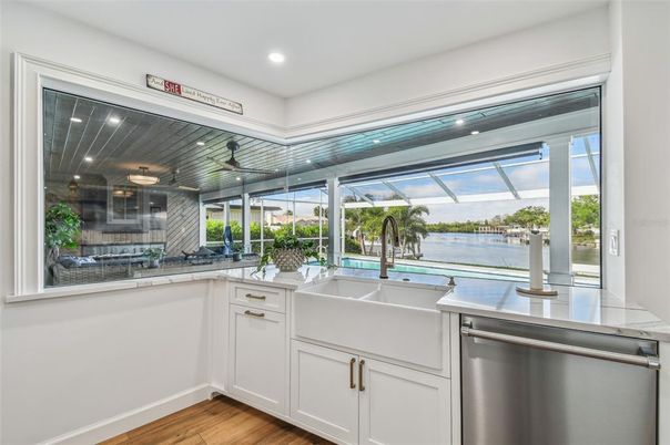 Interior, Kitchen, Recessed Lighting, Stainless Steel Appliances, Water, Wood Texture Flooring