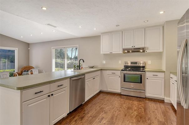 Interior, Kitchen, Recessed Lighting, Stainless Steel Appliances, Wood Texture Flooring