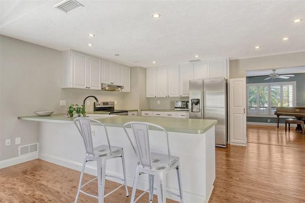 Interior, Kitchen, Recessed Lighting, Stainless Steel Appliances, Wood Texture Flooring