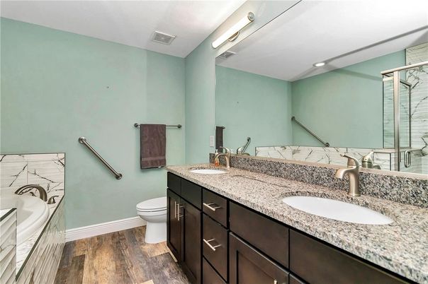 Bathroom, Dual Sink Vanities, Interior, Recessed Lighting, Wood Texture Flooring