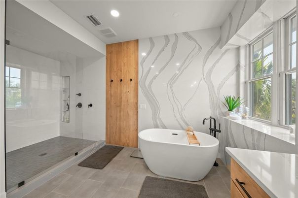 Bathroom, Free Standing Baths, Glass Shower, Interior, Marble Walls, Recessed Lighting