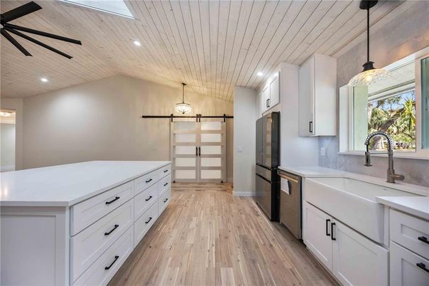 Empty room, Fireplace, Interior, Recessed Lighting, Stone Walls, Wood Texture Flooring