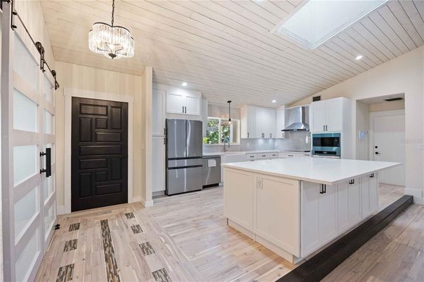 Interior, Kitchen, Pendant Lights, Recessed Lighting, Stainless Steel Appliances, Wood Texture Flooring