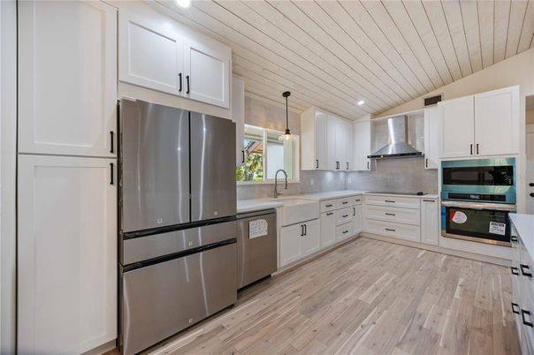 Interior, Kitchen, Pendant Lights, Recessed Lighting, Stainless Steel Appliances, Wood Texture Flooring