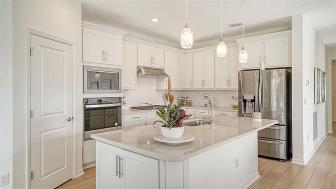 Interior, Kitchen, Pendant Lights, Recessed Lighting, Stainless Steel Appliances, Wood Texture Flooring