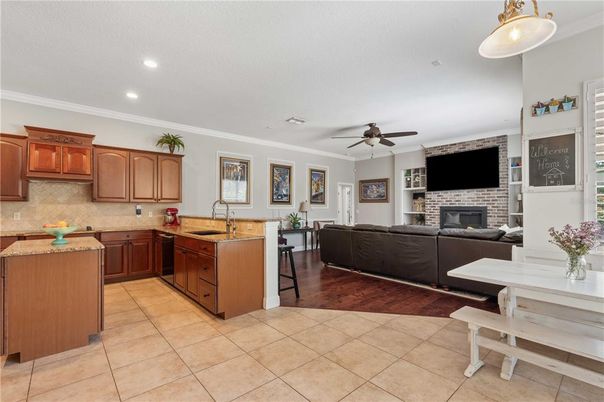 Fireplace, Interior, Kitchen, Living room, Recessed Lighting, Wood Texture Flooring