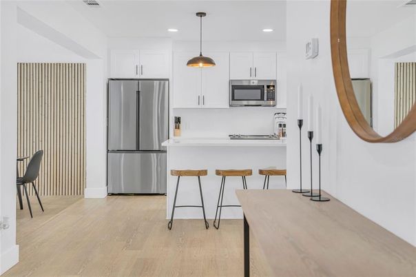 Interior, Kitchen, Pendant Lights, Recessed Lighting, Stainless Steel Appliances, Wood Texture Flooring