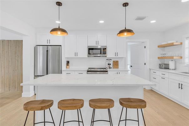 Interior, Kitchen, Pendant Lights, Recessed Lighting, Stainless Steel Appliances, Wood Texture Flooring