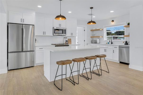 Interior, Kitchen, Pendant Lights, Recessed Lighting, Stainless Steel Appliances, Wood Texture Flooring