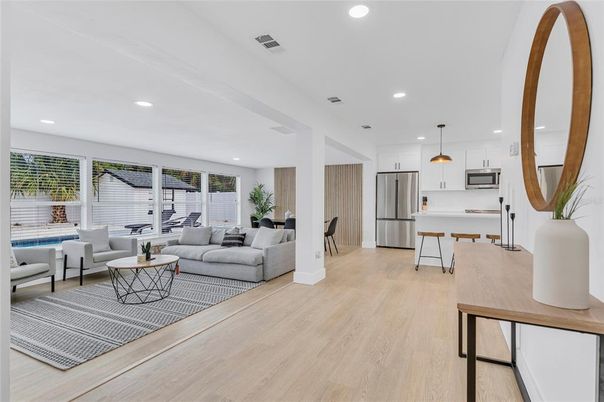 Dining room, Interior, Kitchen, Living room, Pendant Lights, Recessed Lighting, Stainless Steel Appliances, Wood Texture Flooring
