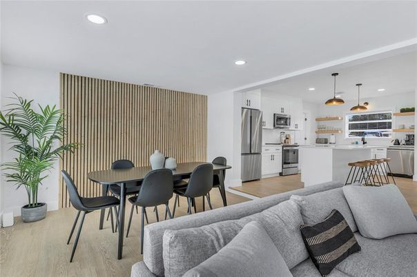 Dining room, Interior, Kitchen, Living room, Pendant Lights, Recessed Lighting, Stainless Steel Appliances, Wood Texture Flooring