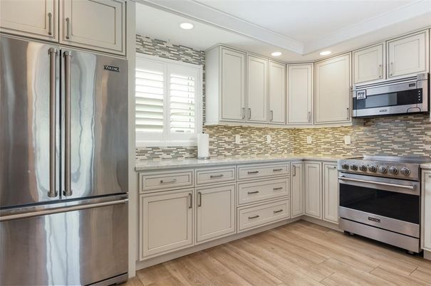 Interior, Kitchen, Recessed Lighting, Stainless Steel Appliances, Wood Texture Flooring