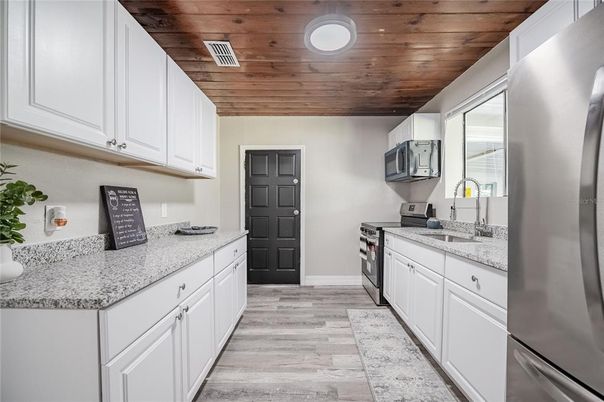 Interior, Kitchen, Recessed Lighting, Stainless Steel Appliances, Wooden Ceilings, Wood Texture Flooring