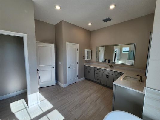 Bathroom, Dual Sink Vanities, Interior, Recessed Lighting, Wood Texture Flooring
