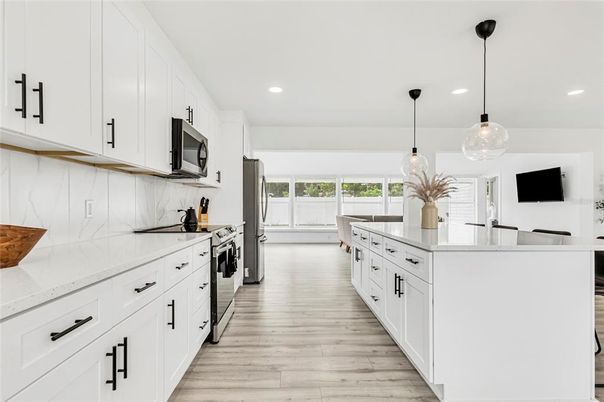 Interior, Kitchen, Pendant Lights, Recessed Lighting, Stainless Steel Appliances, Wood Texture Flooring