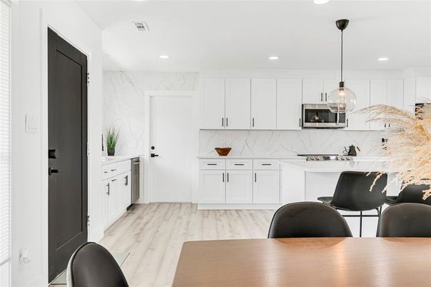 Interior, Kitchen, Marble Walls, Pendant Lights, Recessed Lighting, Wood Texture Flooring