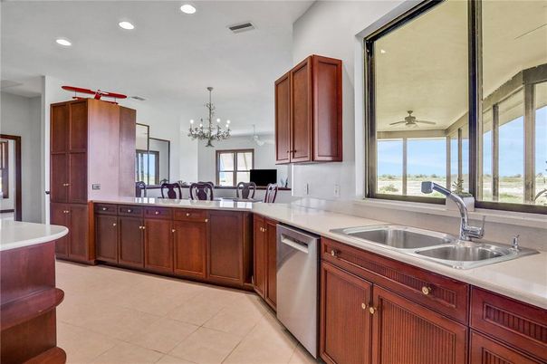 Chandelier, Dining room, Interior, Kitchen, Recessed Lighting, Stainless Steel Appliances