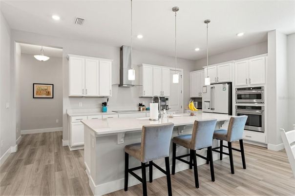 Interior, Kitchen, Pendant Lights, Recessed Lighting, Stainless Steel Appliances, Wood Texture Flooring