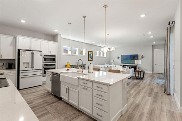 Dining room, Interior, Kitchen, Pendant Lights, Recessed Lighting, Stainless Steel Appliances, Wood Texture Flooring