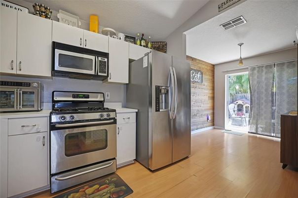 Interior, Kitchen, Pendant Lights, Stainless Steel Appliances, Wood Texture Flooring